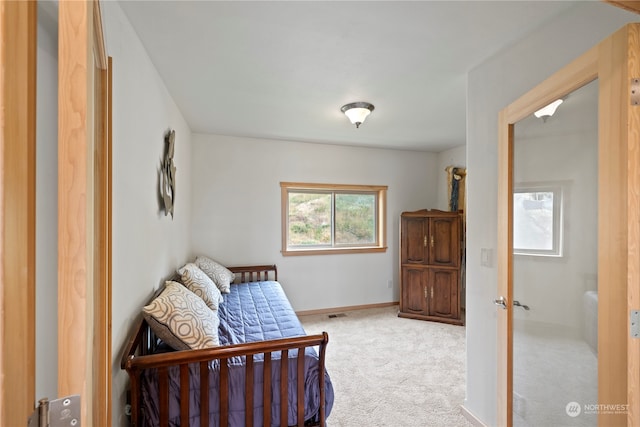 sitting room with light colored carpet