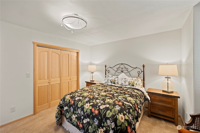 carpeted bedroom featuring a closet