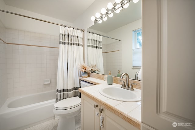 full bathroom with vanity, toilet, and shower / tub combo with curtain