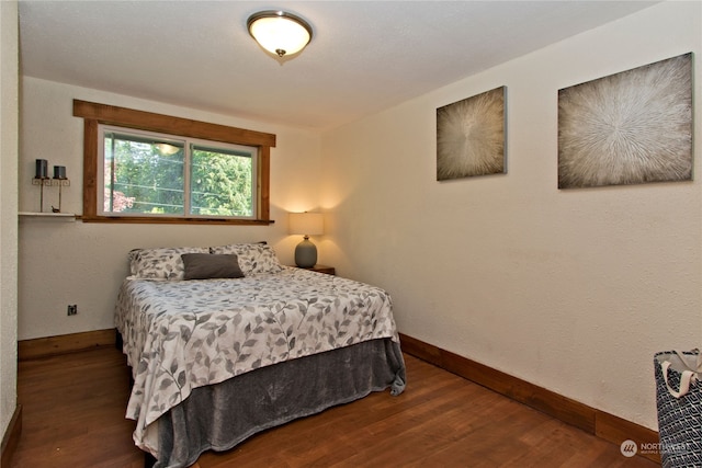 bedroom featuring hardwood / wood-style flooring