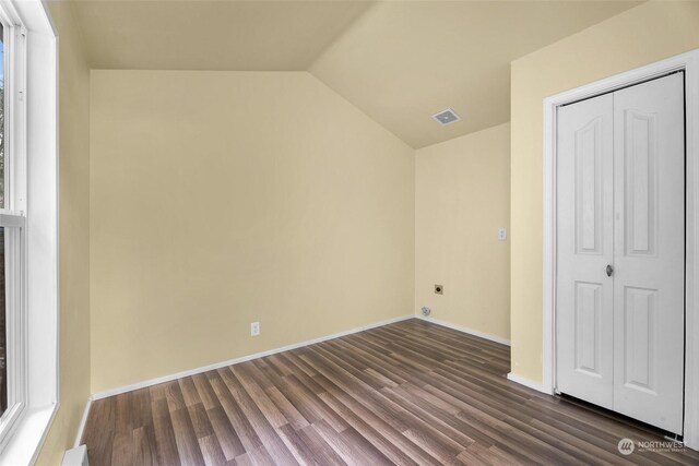 4220 Brays Way, Bellingham, WA 98226 - unfurnished bedroom featuring dark wood-style floors, lofted ceiling, and a closet