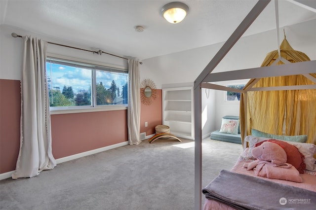 bedroom featuring light carpet