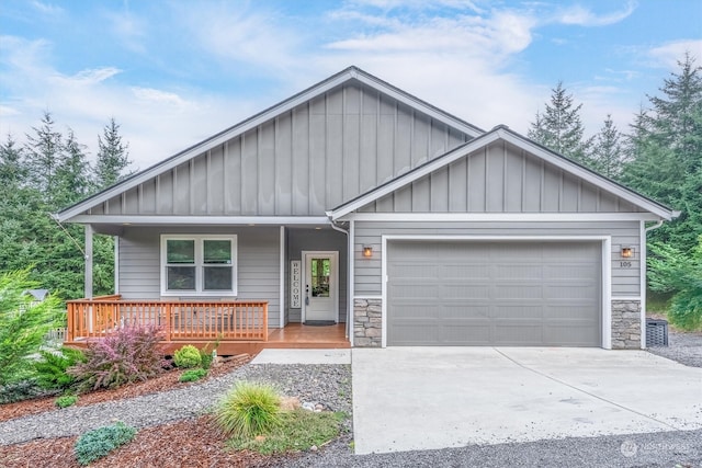 view of front of house with a garage and a porch