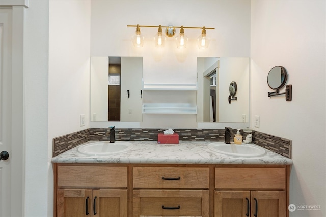 bathroom with vanity and decorative backsplash