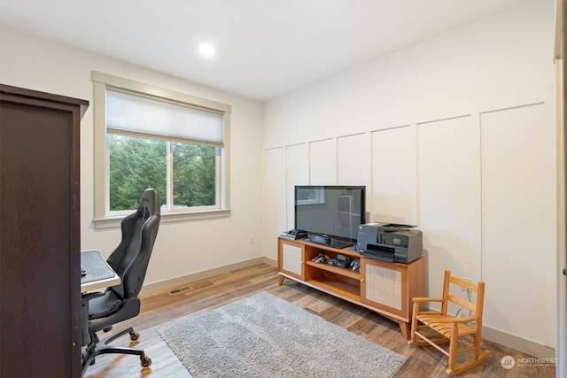 office area with wood-type flooring