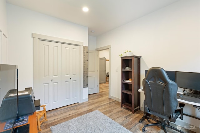 home office featuring light hardwood / wood-style flooring