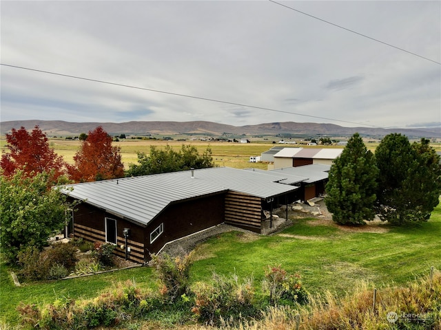 bird's eye view with a rural view and a mountain view