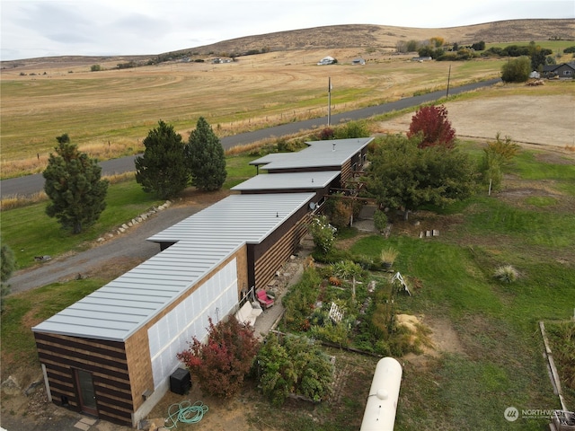 aerial view featuring a mountain view and a rural view