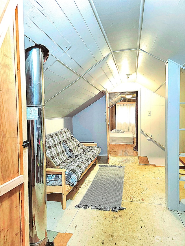 bedroom with lofted ceiling