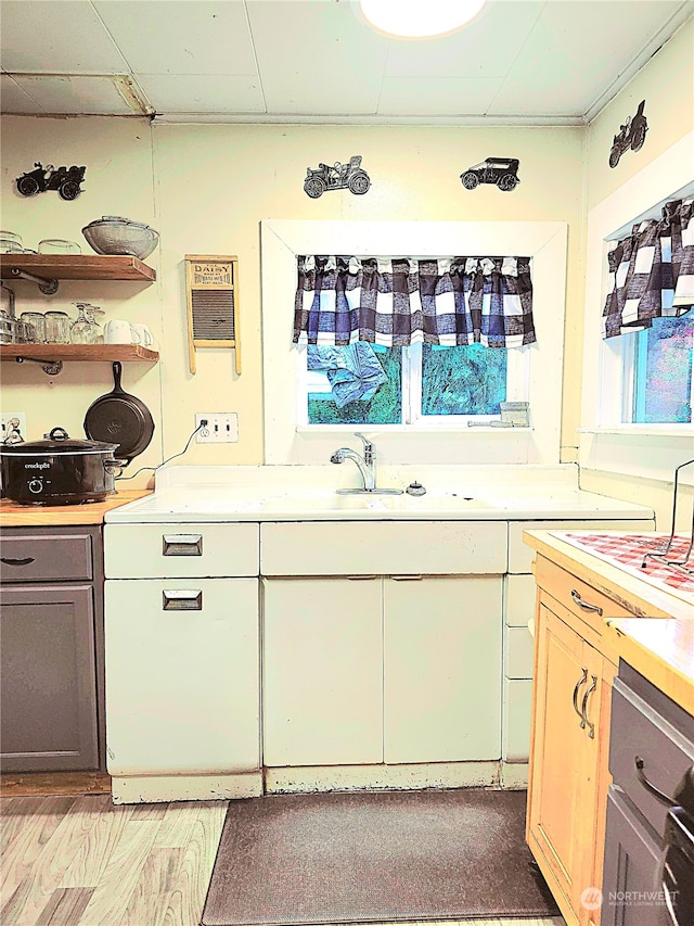 kitchen with light wood-type flooring