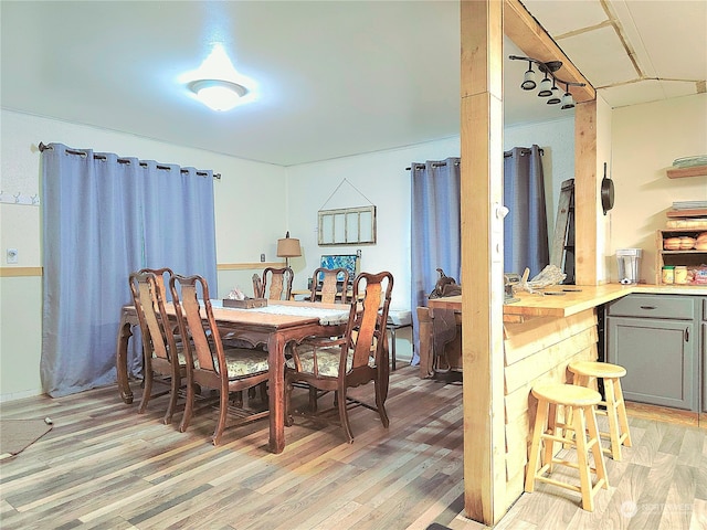 dining room featuring light hardwood / wood-style flooring