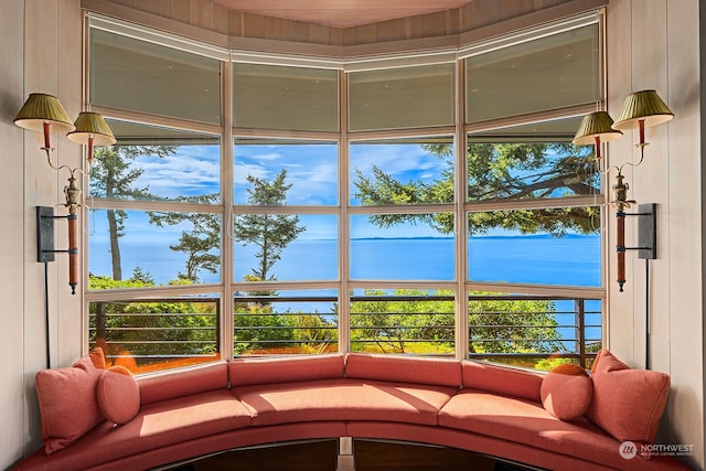 sunroom with a water view