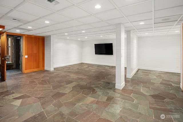 basement with wood walls