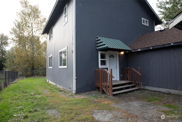 exterior space with a lawn