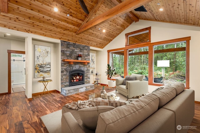 living room with a wealth of natural light, wood ceiling, and dark hardwood / wood-style flooring