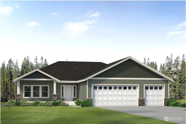 view of front of home with a garage and a front lawn