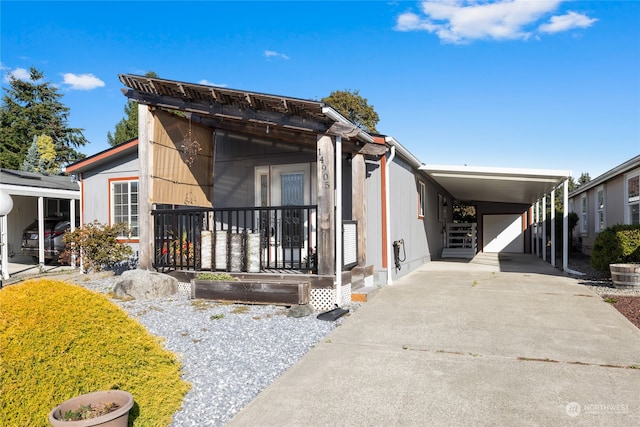 view of front facade with a carport