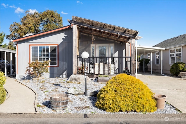 view of front of property with a carport