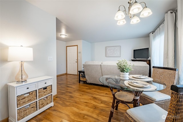 4232 Wintergreen Cir Unit 160, Bellingham, WA 98226 - dining area with a chandelier, light wood-style floors, and baseboards