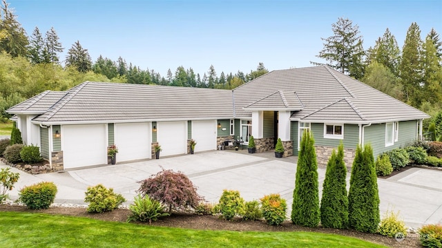 view of front of property with a garage