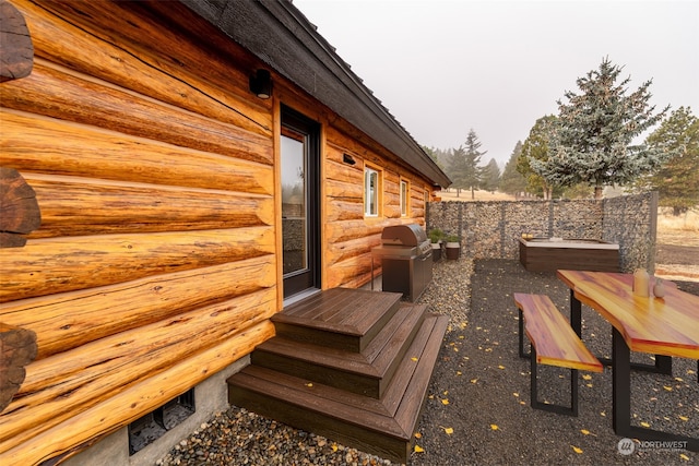 wooden deck with area for grilling