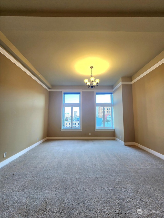 714 Market St Unit 303, Tacoma, WA 98402 - empty room with a chandelier, baseboards, and carpet floors