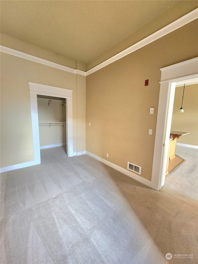 714 Market St Unit 303, Tacoma, WA 98402 - carpeted empty room featuring visible vents and baseboards