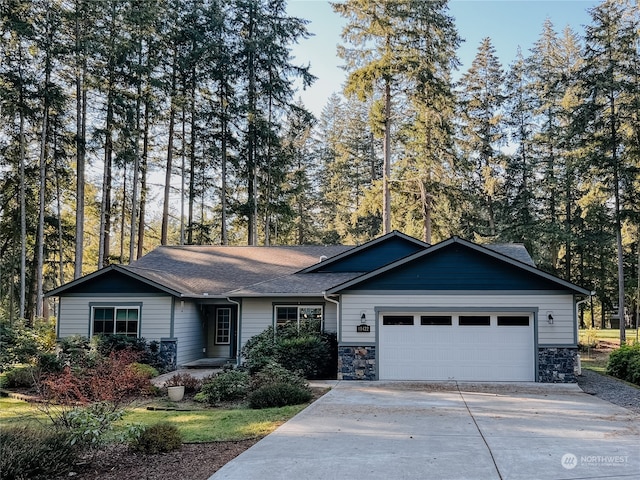 ranch-style home featuring a garage