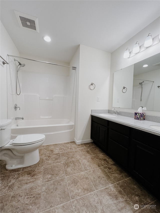 full bathroom featuring tile patterned flooring, vanity, toilet, and bathtub / shower combination