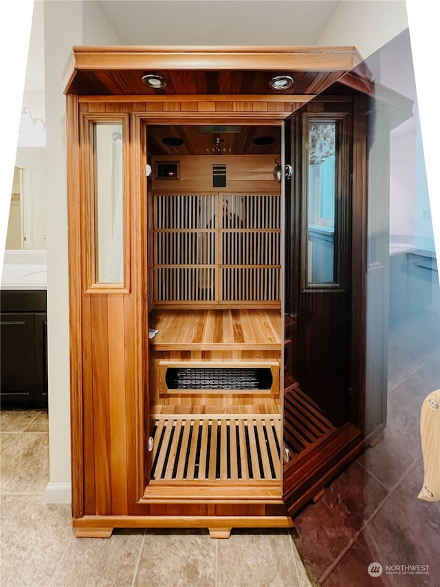 view of sauna / steam room featuring tile patterned floors