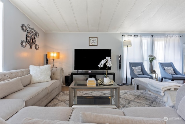 living room with ornamental molding