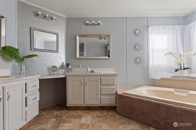 bathroom with a tub to relax in, crown molding, and vanity