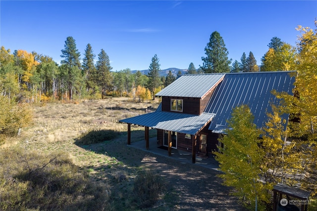 exterior space featuring a mountain view