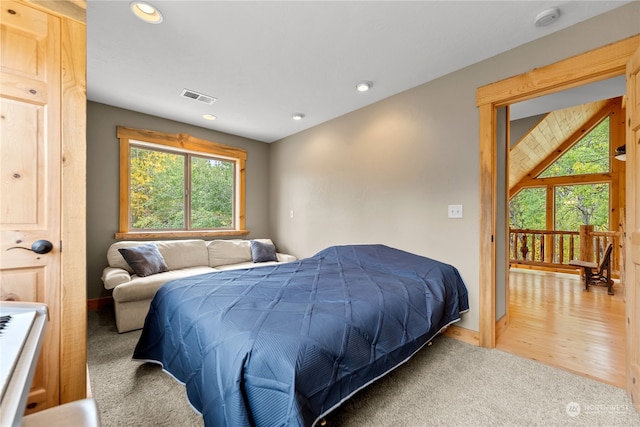 bedroom with light colored carpet