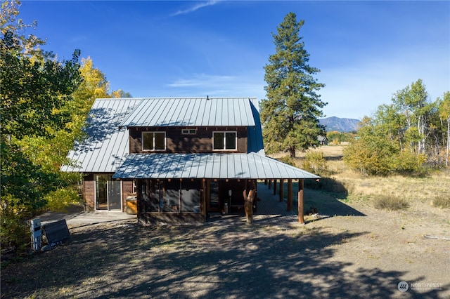 view of front facade featuring a mountain view