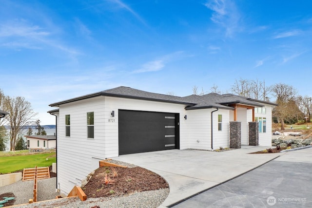 8721 Semiahmoo Dr, Blaine, WA 98230 - view of side of property featuring fence, an attached garage, and driveway