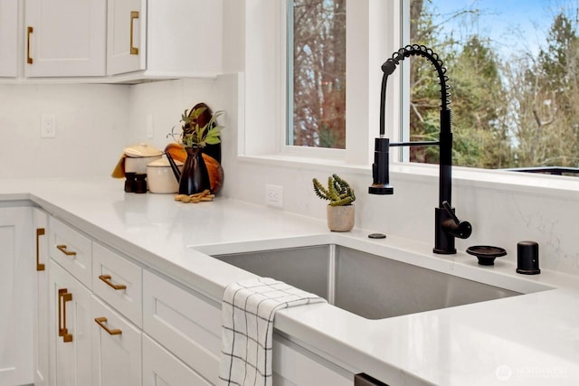 8721 Semiahmoo Dr, Blaine, WA 98230 - kitchen with a sink, white cabinets, and light countertops