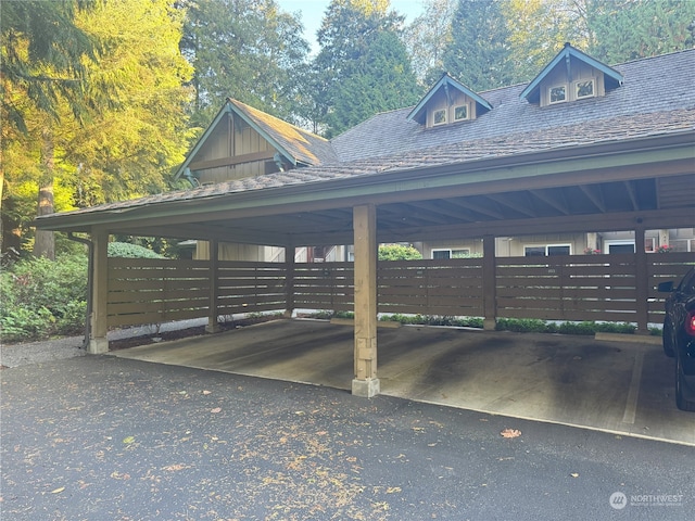 view of vehicle parking featuring a carport