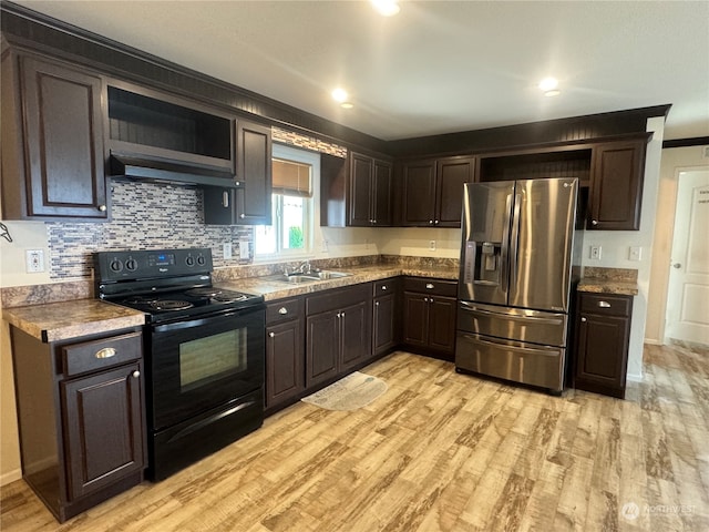 kitchen featuring sink, stainless steel refrigerator with ice dispenser, light hardwood / wood-style flooring, electric range, and dark brown cabinetry