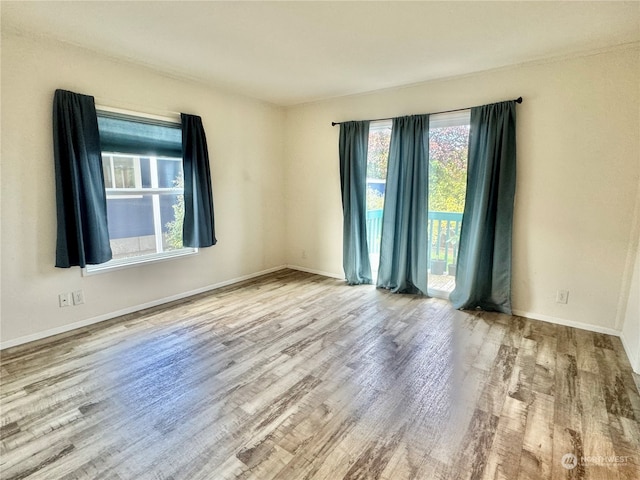 empty room featuring light hardwood / wood-style floors