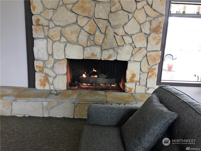 room details with a stone fireplace