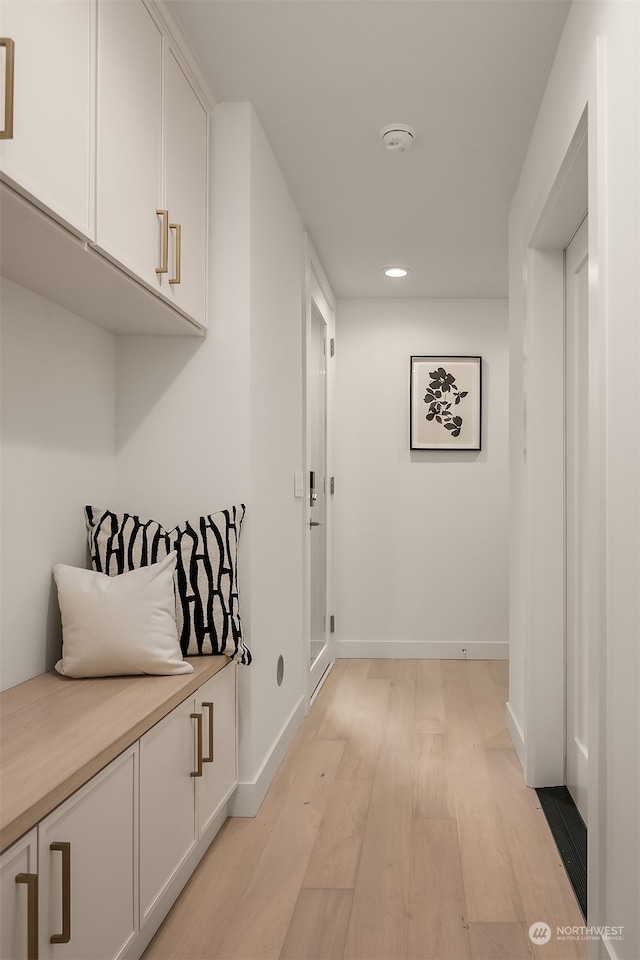 mudroom featuring light hardwood / wood-style flooring