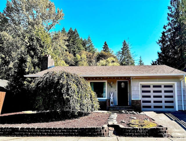 view of front of home with a garage