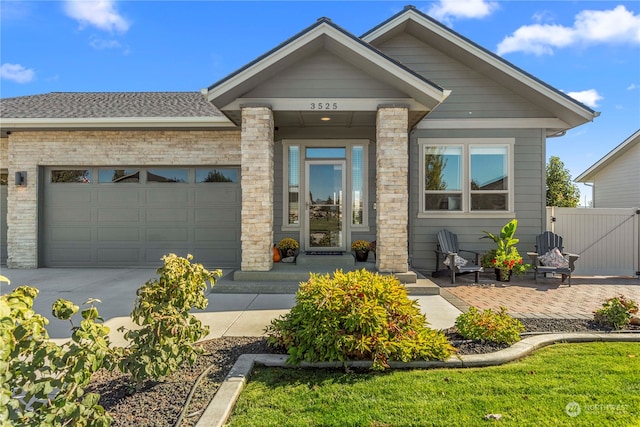 view of front of property featuring a garage