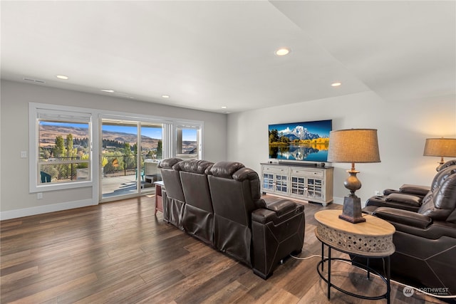 living room featuring dark hardwood / wood-style floors