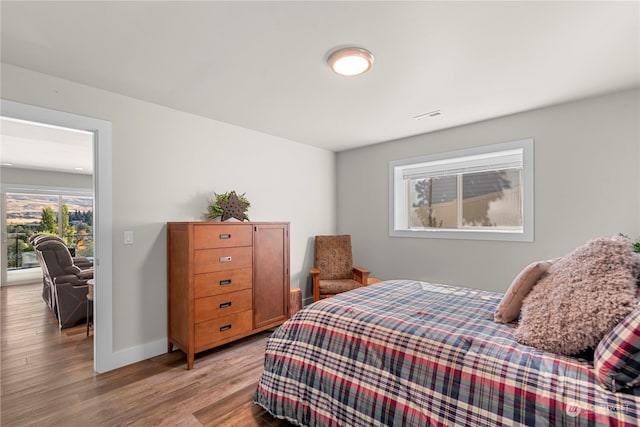 bedroom featuring light wood-type flooring