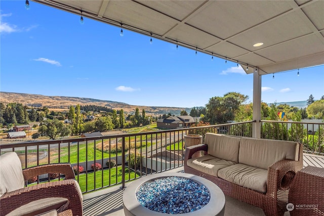 balcony featuring an outdoor living space