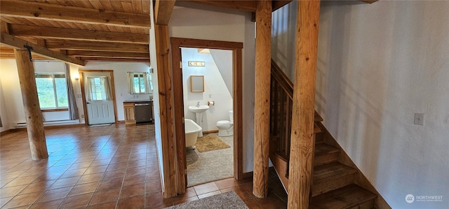 hall with tile patterned flooring, wood ceiling, and vaulted ceiling with beams