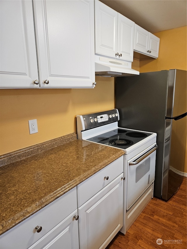 31003 14th Ave S Unit E-10, Federal Way, WA 98003 - kitchen with dark stone countertops, white electric range, dark wood-type flooring, and white cabinetry