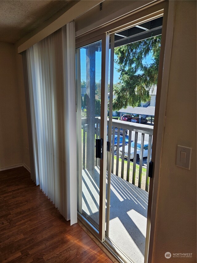 31003 14th Ave S Unit E-10, Federal Way, WA 98003 - doorway to outside featuring dark hardwood / wood-style flooring